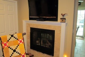 Basement fireplace remodeling contractor - Accell Construction.